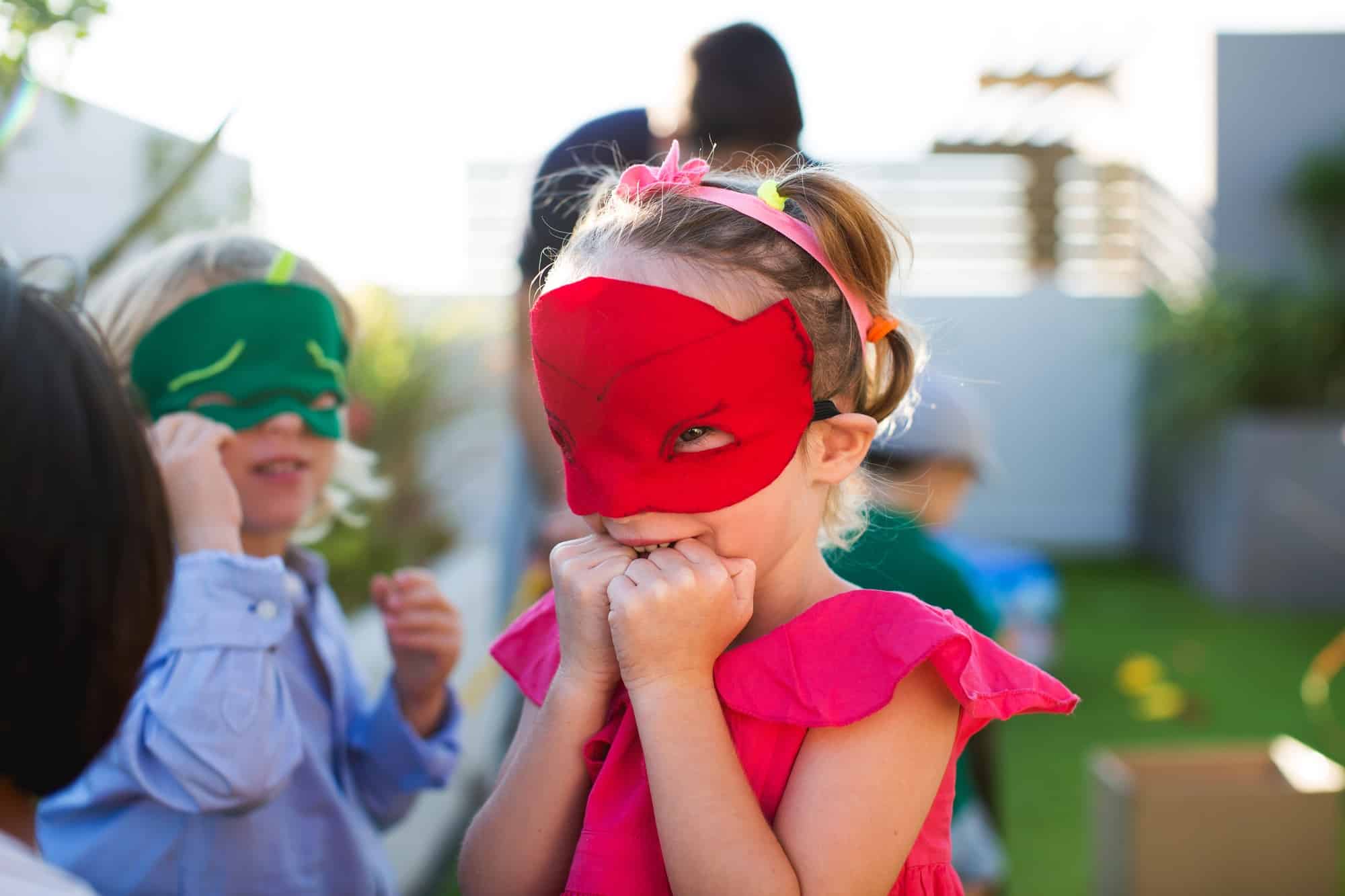 Children in disguise playing at the birthday party