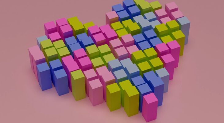 Geometric heart divided in pixel blocks over pink background