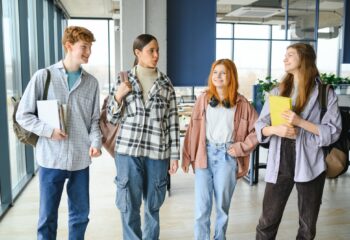 Happy high school students in the classroom